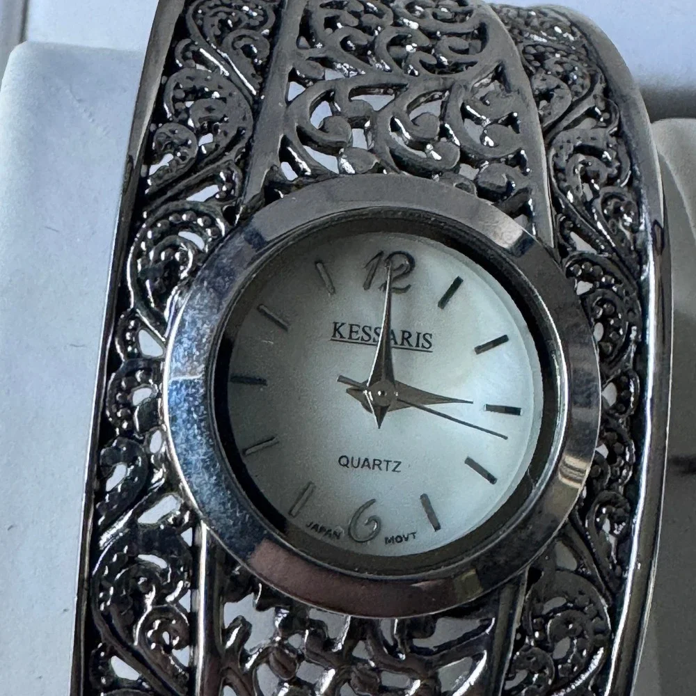 Kessaris Womens Silver Tone Filigree Cuff Watch and Matching Bangle Bracelet Set